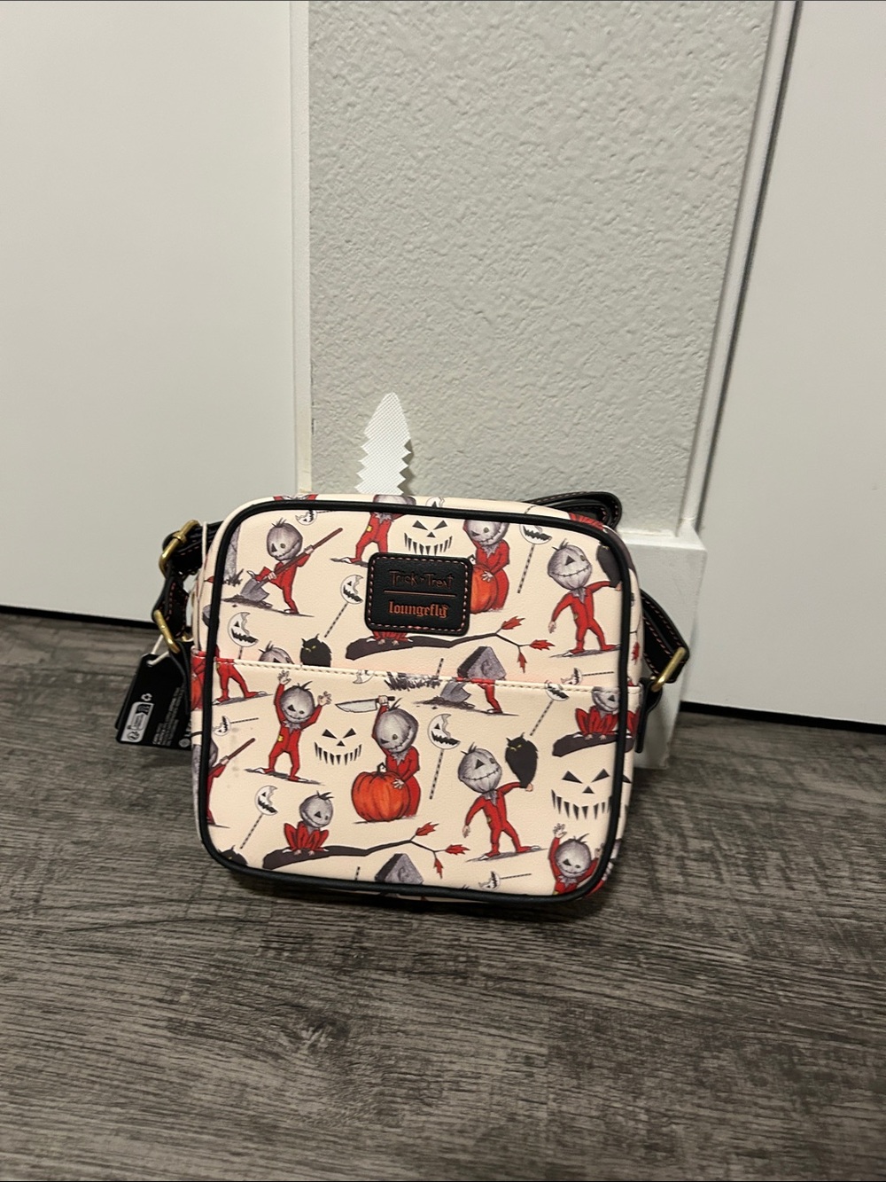 Loungefly Cream Crossbody Bag with Red Halloween Character Print